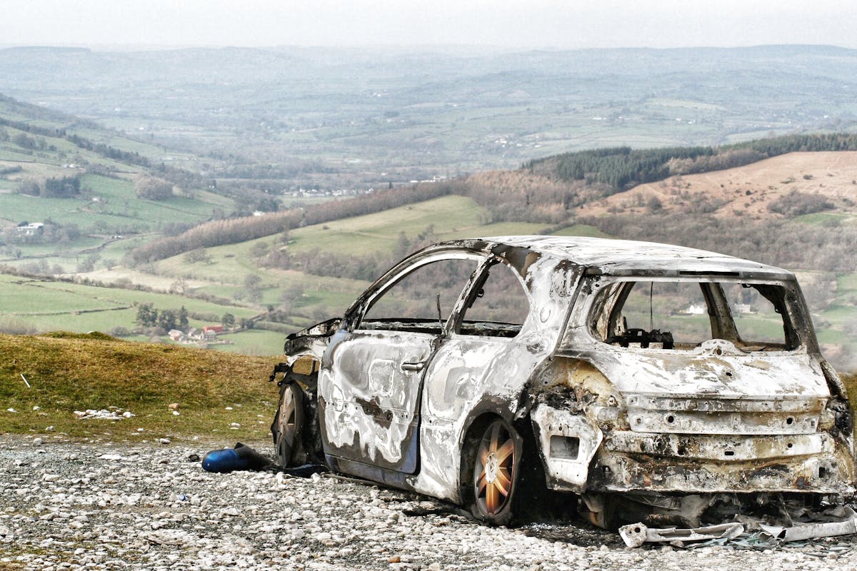 A Broken Car Parked Outside