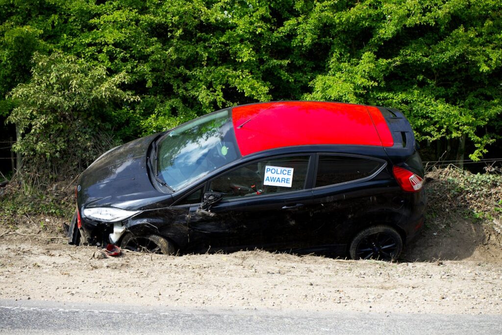 Broken Car on Verge