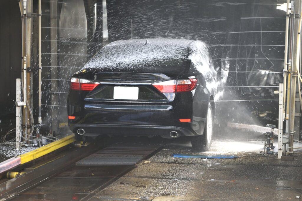 Carwashed Black Sedan