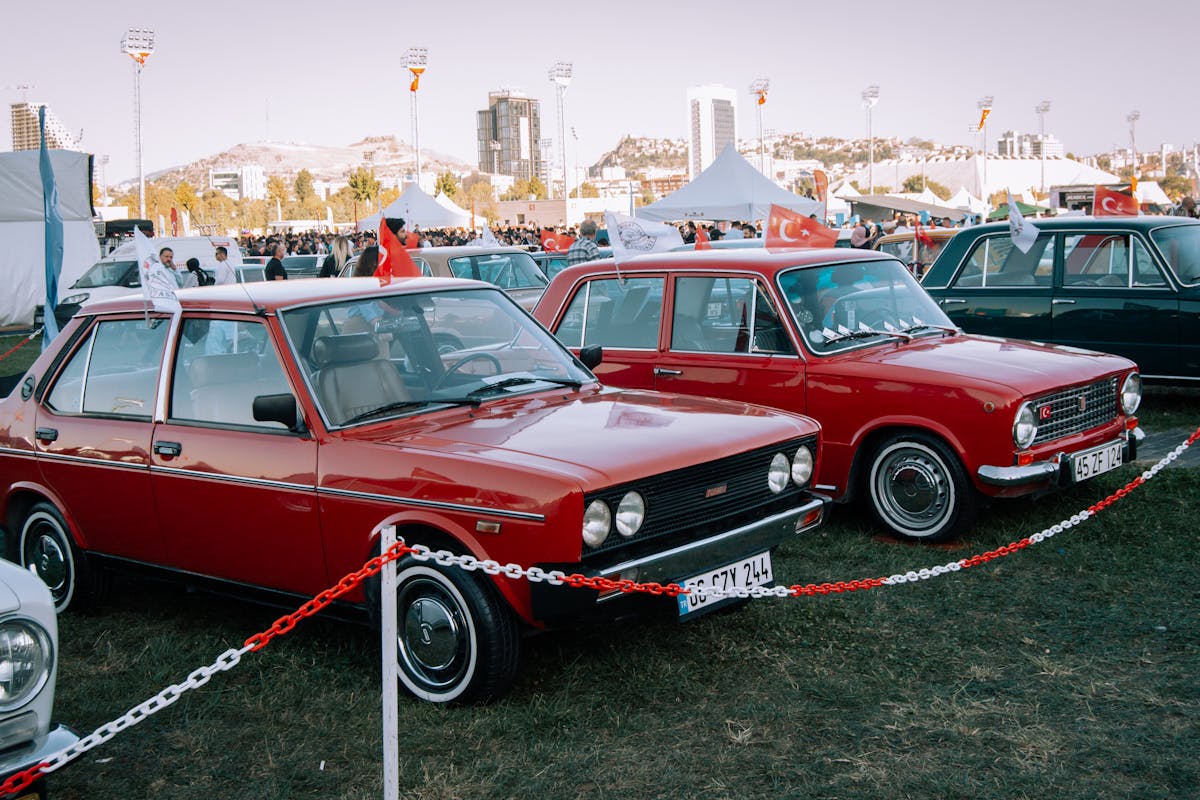 Red Turkish Murats 131 and 124 Exhibited at Car Show