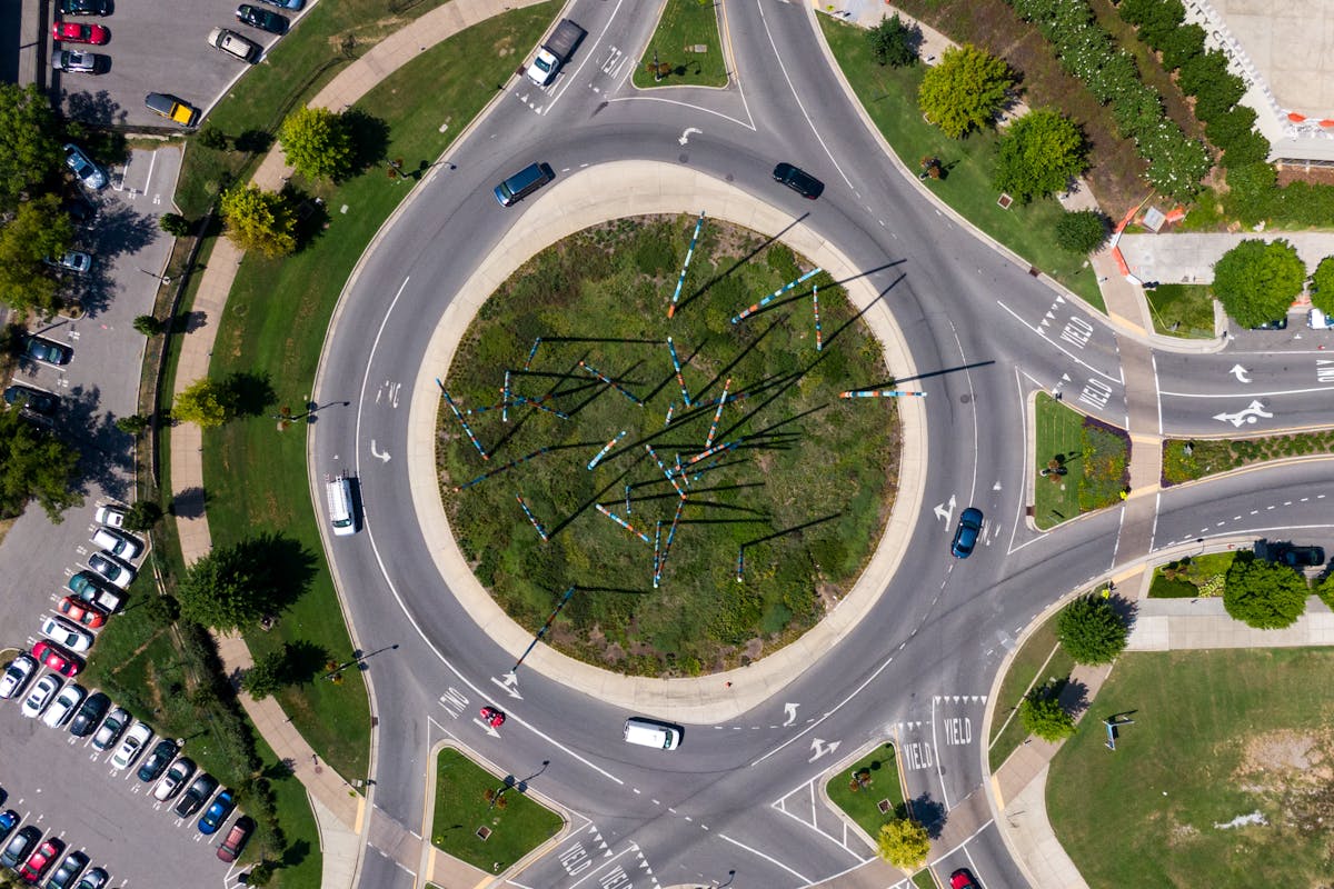 Vehicles Passing On A Roundabout