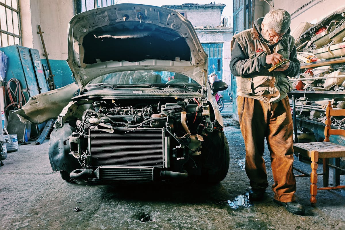 A Car Mechanic in His Workshop
