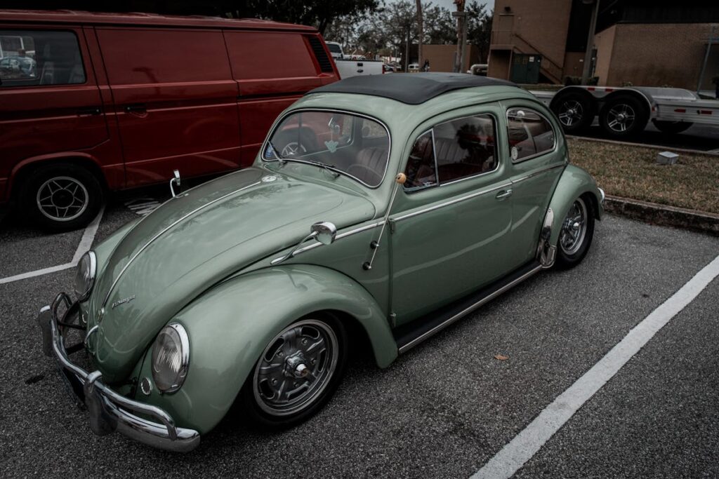 Green Old-fashioned Volkswagen with Sunroof