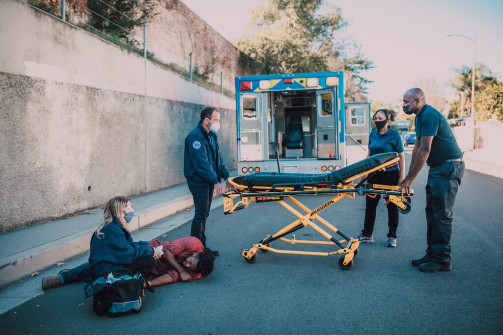 Paramedics Helping A Man