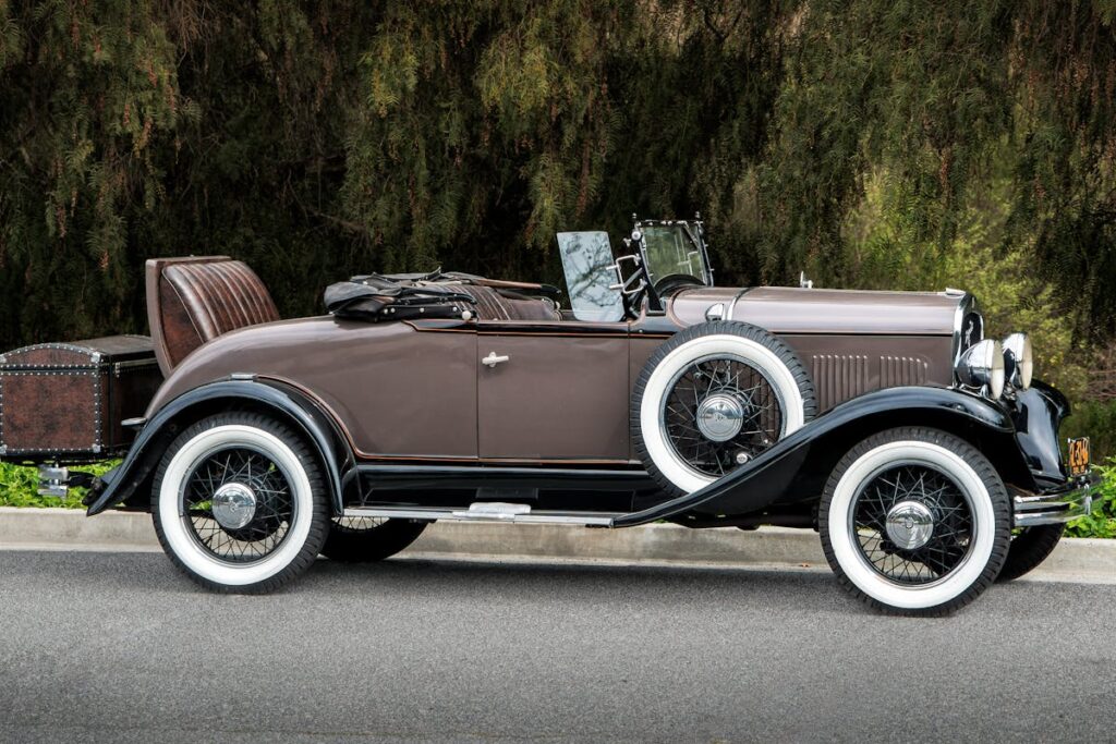 Classic brown convertible parked outdoors with vintage charm in Laguna Niguel, CA.